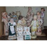 A group of ten continental and other 19th century and later porcelain figures, tallest 33cm,