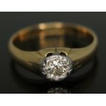 A hallmarked 18ct gold diamond ring, the stone weighing approx. 0.21ct, gross wt. 5.53g, size R.