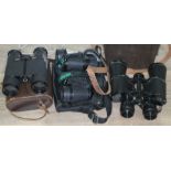 Three pairs of binoculars including a pair of Carl Zeiss Dialyt 8x30B and two others. Condition -