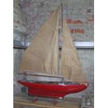 An early 20th century fine quality hand built teak model pond sailing yacht with single mast, two