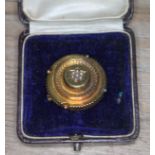 A Victorian hallmarked 15ct gold and seed pearl mourning brooch, diameter 30mm, weight 6.3g.