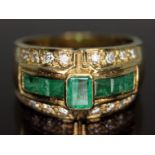 An emerald and diamond ring, the central stone weighing approx. 0.38ct, band unmarked, gross wt. 4.