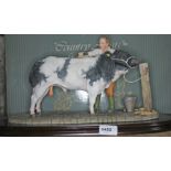 A Countyry Artists boxed figure of a bull and farmer, Belgian Blue - 'The Winning Partnership', with