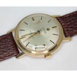 A vintage 1960s hallmarked 9ct gold Roamer Vanguard 304 wristwatch with with signed champagne