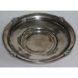 A four footed hallmarked silver dish, diam. 22cm, wt. 10oz.