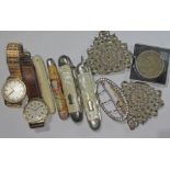 A mixed lot comprising four vintage penknives, two belt buckles, two vintage wristwatch and a Fat