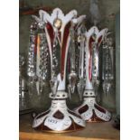 A pair of cranberry, white and gilded bohemian glass drop lustre vases, heights 25cm. Condition: