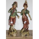 A pair of Royal Dux figures of Coutiers in 18th century dress, model numbers 113 & 114, heights 45cm