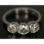 A three stone diamond ring, the stones weighing approx. 0.33ct, 0.45ct and 0.41ct, band with 18ct