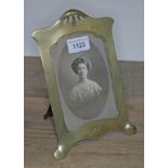 A continental brass seccesionist style photo frame, 22cm x 15cm, to fit 15 x 10cm photo.