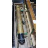 A WWI gun sighting telescope in wooden case.