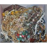 A box of costume jewellery.