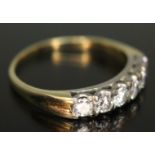 A hallmarked 18ct gold six stone diamond ring, total approx. diamond wt. 0.60ct, gross wt. 3.34g,