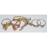 A mixed lot of jewellery comprising two hallmarked 9ct gold rings, a hallmarked 9ct gold diamond set