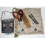 A mixed lot comprising a needlework sampler, a Turkish POW bead bag and necklace, two fountain