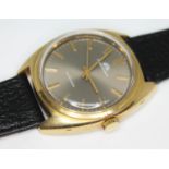 A vintage 1970s Carl F. Bucherer gold plated automatic wristwatch having signed taupe coloured