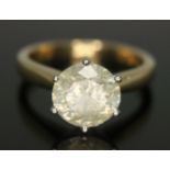 A diamond solitaire ring, the stone weighing approx. 2.46ct, hallmarked 18ct gold band, gross wt.