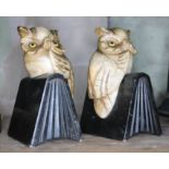A pair of marble novelty owl book ends, height 14cm.