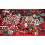 A jewellery box and contents, mainly costume jewellery, beads, silver etc.
