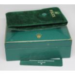 A Rolex watch box and pouch.