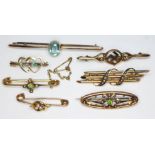A group of seven brooches, various 9ct marks, gross wt. 12.92g.