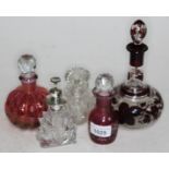 Five antique cut glass and crystal scent bottles.