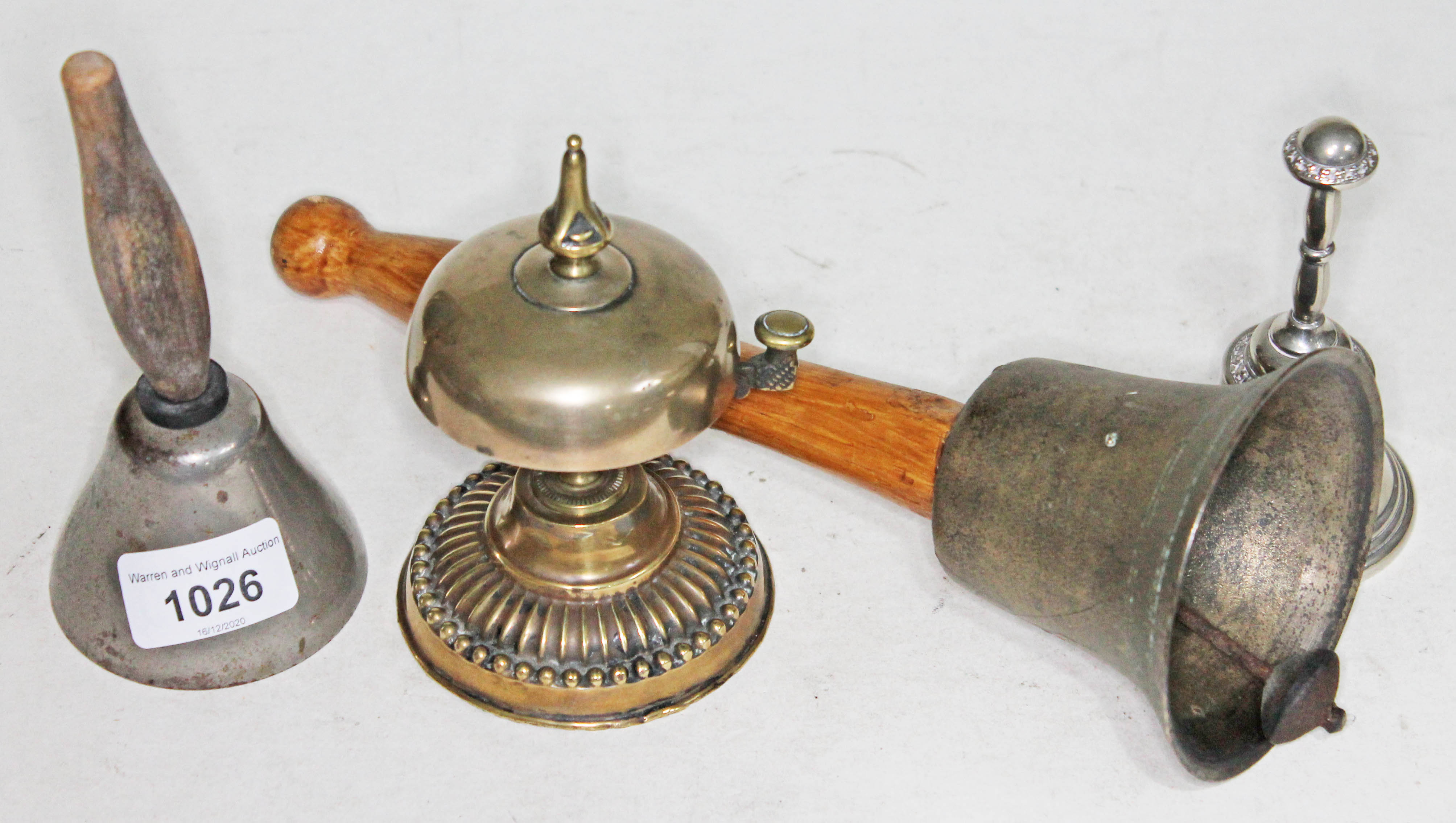 Vintage brass counter bell, dinner bells and hand bell.