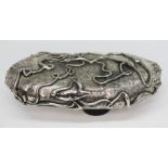 Giorgio Vigna (Italian b1955), a Modernist cast and trailed white metal brooch of pebble form with