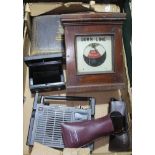 A box of mixed items including an old line detector, Sony solid state radio, old money tin, etc