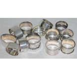 13 hallmarked silver serviette rings, together with one marked 'Sterling Silver' and another