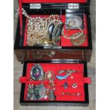 A jewellery box and contents including a hallmarked 22ct gold wedding band wt. 0.88g, various