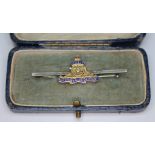 A regimental sweetheart brooch marked '9ct' and 'silver', gross wt. 4.06g.