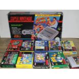 A Super Nintendo Entertainment System Street Fighter II console and various games.