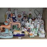 A collection 19 mainly 19th century Staffordshire figures including flat backs, dogs, etc, tallest