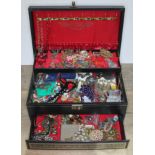 A jewellery box and contents comprising mainly costume jewellery.