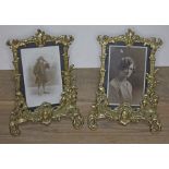 A pair of cast brass photo frames, height 22cm.