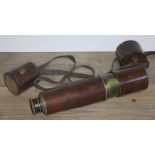 A WW1 5 drawer telescope with leather caps. Leather straps showing signs of wear.Case in good