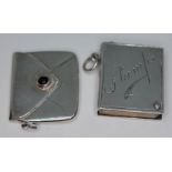 Two hallmarked silver stamp cases.