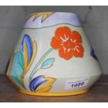 An art deco conical squat Shelley vase, with floral and leaf pattern on mainly yellow ground,