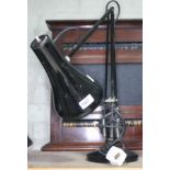 A Herbert Terry & Sons black angle poise lamp.