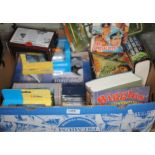 A box of mixed boxed Corgi and other die cast models and Commando books and comics