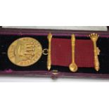 A hallmarked 9ct gold Masonic medal, each piece mark, gross wt. 25.92g (including ribbon).