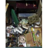 A box of mixed items including a WWI Christmas tin (empty) and other vintage tins, old slide