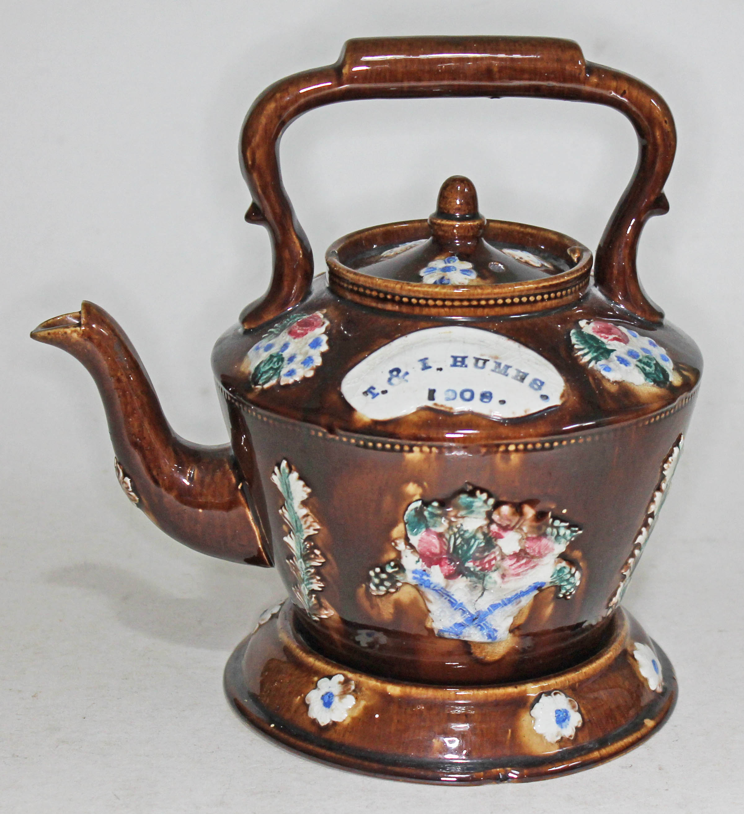 Edwardian sprigged bargeware teapot and stand with named plaque T & I Humes 1908