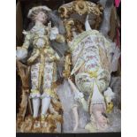 A pair of continental porcelain figures of a couple in 18th century dress - damaged - heights 50cm &