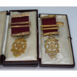 Two hallmarked 9ct gold Masonic medals, all pieces marked, gross wt. 15.64 (including ribbon).