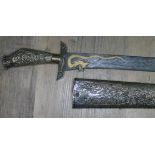 An Indonesian Java pedang, blade with gilt dragon and scorpion length 55.5cm, embossed grip and
