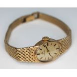 A ladies hallmarked 9ct gold Omega wristwatch, gross wt. 21.57g.