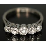 A five stone old European diamond ring, the central stone weighing approx. 0.36ct, total approx.