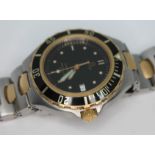 An 18ct gold and stainless steel Omega Seamaster Professional 200m quartz wristwatch reference 396.